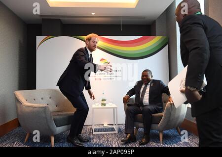 Harry, Duke of Sussex, meets Filipe Nyusi, President of Mozambique (seated) during the UK-Africa Investment Summit at the Intercontinental Hotel London. Stock Photo