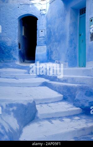 Traditional Blue-Painted Architecture, Blue Doors & Steps in Chefchaouen or Chaouen Morocco Stock Photo