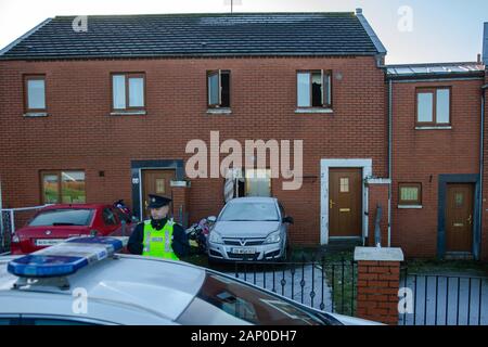 Police guard a house at murder scene Stock Photo - Alamy