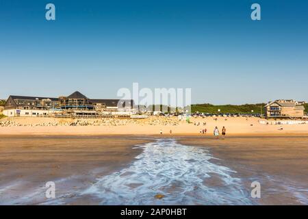 Warm evening sunlight over Fistral Beach in Newquay in Cornwall. Stock Photo