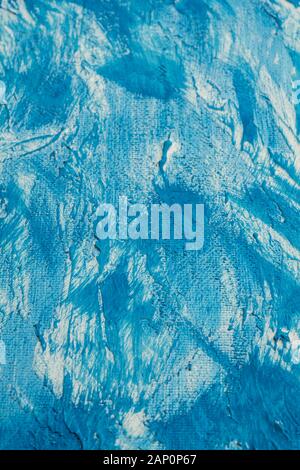 dark blue and white painted canvas as a background Stock Photo