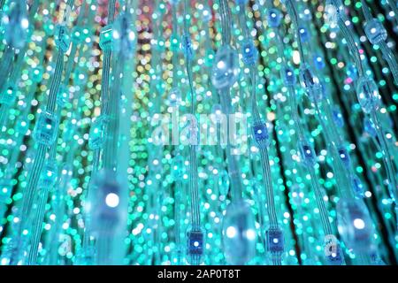 multicolored city led lights beams Stock Photo