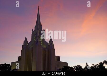 SAN DIEGO, CA -3 JAN 2020- Sunset pink view of the San Diego California Temple, a large white marble Mormon temple for the Church of Jesus Christ of t Stock Photo