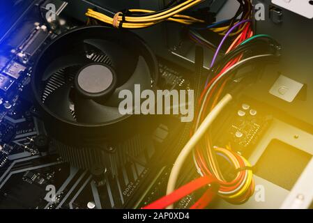 Details of a laptop computer. Computer circuit board and processor cooling fans. PC service and repair concept Stock Photo