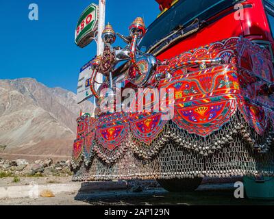Detail of colorfully decorated and painted trucks, driving on the dusty roads of Karakorum Highway Stock Photo
