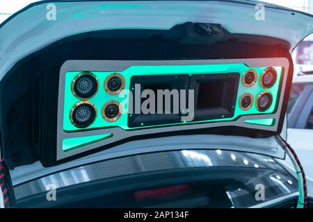 colorful lights of stereo and speakers in car Stock Photo