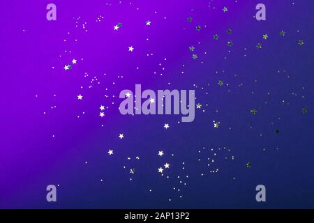 Trendy neon background with stars. Violet and blue colors. The concept of celebrations, the Day of St. Valentine, Christmas, New Year, holiday, birthday, etc. Stock Photo