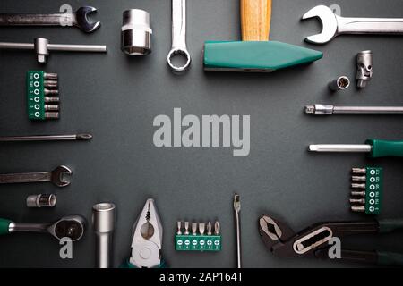 Set of tools over black background, top view with space for text Stock Photo