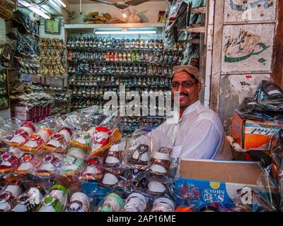 Vendor selling shoes in the bazaar Stock Photo