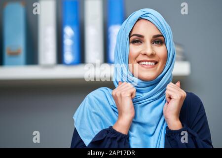 Muslim female student learning at home Stock Photo