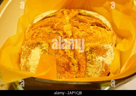 Crusty miracle overnight no knead bread in a Dutch oven Stock Photo