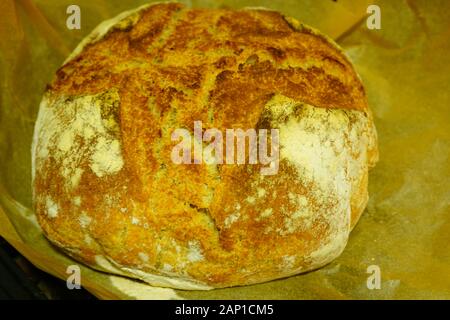 Crusty miracle overnight no knead bread in a Dutch oven Stock Photo