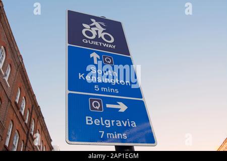 direction sign for a london cycle quietway route, giving directions and timings to south kensington and belgravia Stock Photo