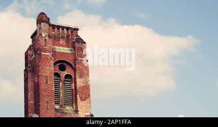 Belfry of church of Saint Jacob the Apostle in Warsaw capital of Poland against sky Stock Photo