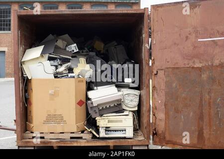 Obsolete computers in a dumpster Stock Photo