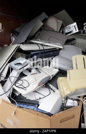 Obsolete computers in a dumpster Stock Photo