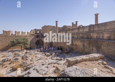 The fortress wall protecting the Acropolis of Lindos, Rhodes, Greece Stock Photo