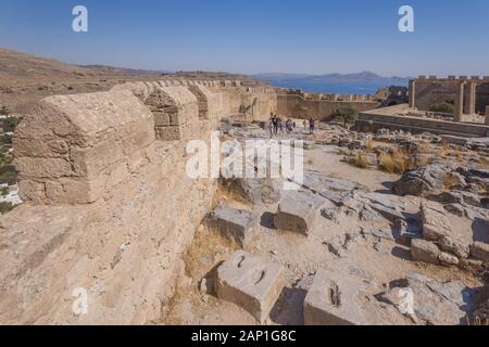 The fortress wall protecting the Acropolis of Lindos, Rhodes, Greece Stock Photo