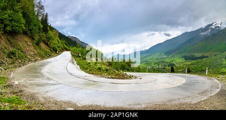 Hairpin turn on the road from Mestia to Ushguli in Georgia Stock Photo