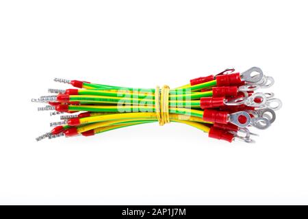 A bunch of yellow-green wires with prefab contacts, grounding cable or wire Stock Photo