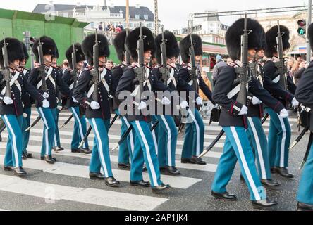 Copenhagen, Denmark - December 9, 2017: The procession of the royal guardsmen to the royal palace Amalienborg. The ceremony of changing the guard of h Stock Photo