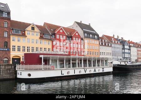 Copenhagen, Denmark - December 10, 2017: Vintage ship Liva II is moored in Nyhavn, 17th-century waterfront, canal and popular touristic district in Co Stock Photo