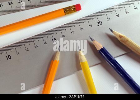 Sharpened pencils, prepared rulers for drawing. Preparation to work. Stock Photo