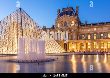 Twilight in the courtyard of Musee du Louvre, Paris, Ile-de-France, France Stock Photo