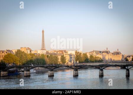 Sunrise over River Seine, Pont des Arts and city of Paris, Ile-de-France, France Stock Photo