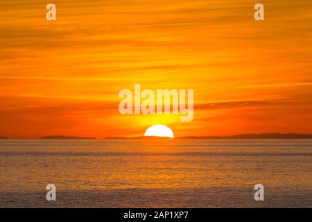 Lyme Regis, Dorset, UK.  20th January 2020. UK Weather.  Sunset at Lyme Regis in Dorset at the end of a cold sunny day.  Picture Credit: Graham Hunt/Alamy Live News Stock Photo