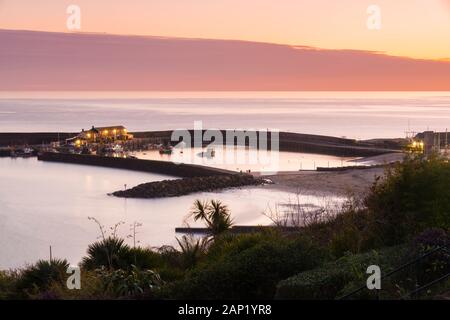 Lyme Regis, Dorset, UK.  20th January 2020. UK Weather.  View of the Cobb Harbour at Lyme Regis in Dorset shortly after sunset at the end of a cold sunny day.  Picture Credit: Graham Hunt/Alamy Live News Stock Photo