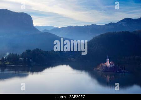 Slovenia. Aerial view over Lake Bled and the island with the pilgrimage church dedicated to the Assumption of Mary (Cerkev Marijinega vnebovzetja) Stock Photo
