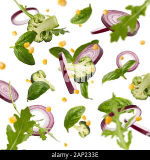 Flying healthy vegetables isolated on white background Stock Photo