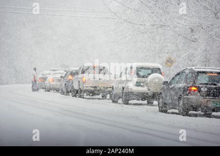 Traffic jam on a Vermont rural highway during a winter blizzard Stock ...