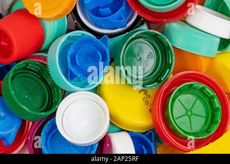 Many colorful plastic closures for bottles Stock Photo