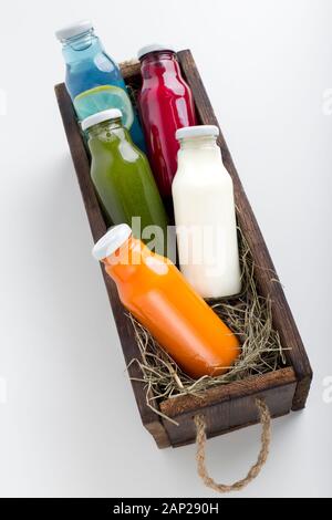 Assorted flavoured smoothies of fresh ingredients in glass jars Stock Photo