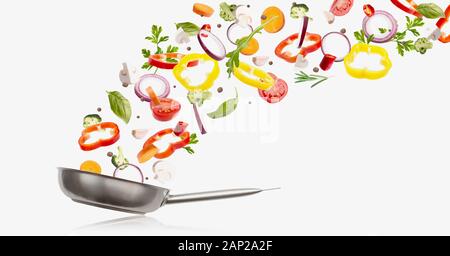 Fresh vegetables flying into a pan, isolated on white Stock Photo