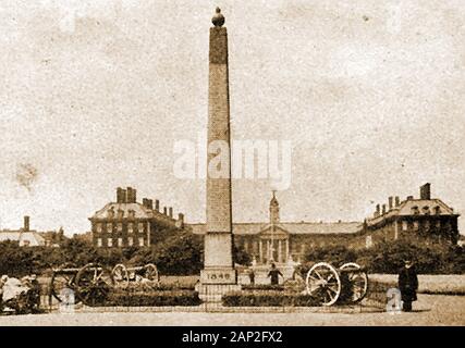 Royal Chelsea Hospital, London, UK (Home of the Chelsea Pensioners) as it was in 1921. Exterior photograph showing the Chillianwalla monument (obelisk) commemorating those who died in battle at Chillianwalla on  13 January 1849 (24th regiment of foot). It was founded as a military  almshouse by King Charles 2nd Stock Photo