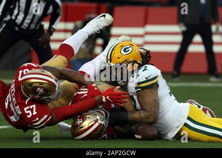 San Francisco 49ers linebacker Dre Greenlaw (57) stands in the rain during  an NFL football game against the Tampa Bay Buccaneers, Sunday, Dec.11,  2022, in Santa Clara, Calif. (AP Photo/Scot Tucker Stock