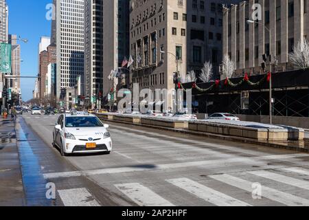 Chicago, USA - December 30, 2018:  Taxi cab on Michigan Avenue in the winter.