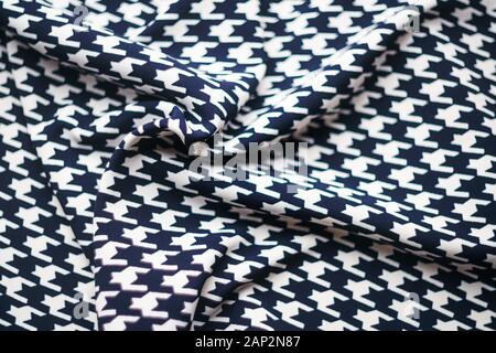 Fabric with goose foot pattern. Crumpled fabric background Stock Photo