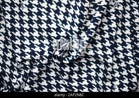 Fabric with goose foot pattern. Crumpled fabric background Stock Photo