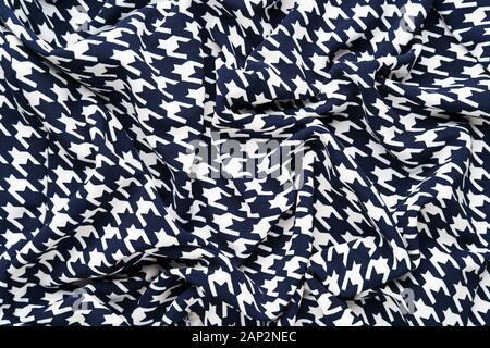 Fabric with goose foot pattern. Crumpled fabric background Stock Photo