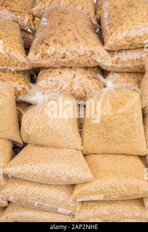 closeup variety of pastas in transparent bags in a store Stock Photo