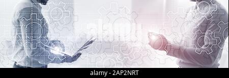 Gears mechanism on panoramic business background. Success Concept Stock Photo