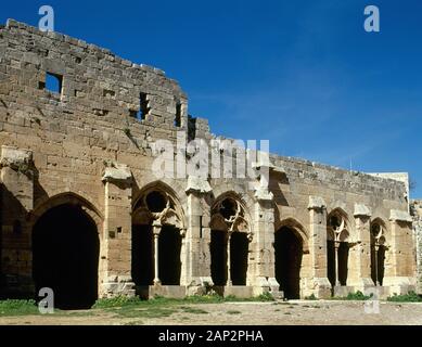 Syria Arab Republic. Krak des Chevaliers. Crusader castle, under control of Knights Hospitaller (1142-1271) during the Crusades to the Holy Land, fell into Arab control in the 13th century. Ruins of the reception hall and gallery. Photo taken before Syrian Civil War. Stock Photo