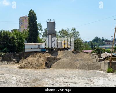 Warehouse on the street gravel and sand Stock Photo