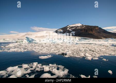 melting Iceberg due to global warming in the Southern Atlantic Ocean, Antarctica Stock Photo