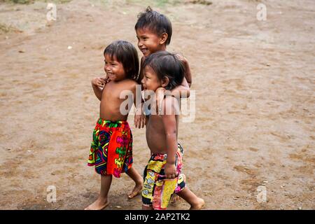 Beautiful children playing and posing for the tourist in the Embera Indigenous Village in the Charges National Park, Panama. Stock Photo