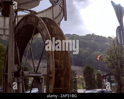 Wheel for collecting water Krasnaya Polyana Sochi 09/01/2018 Stock Photo